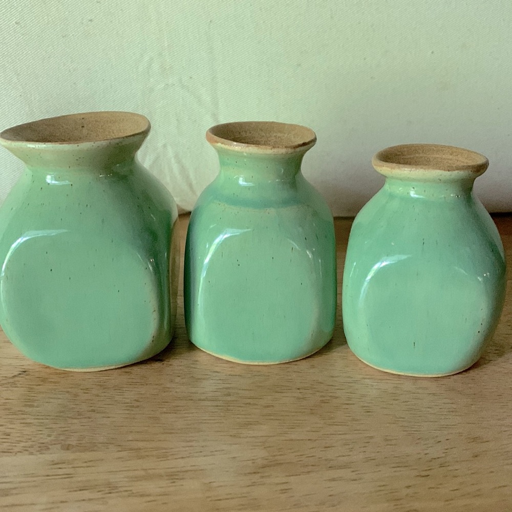 Trío of small stoneware vases